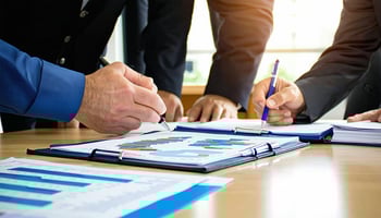 Business team reviewing ASC 842 lease accounting changes