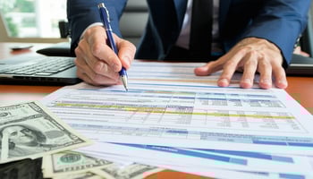 Florida business owner finalizing commercial real estate loan paperwork