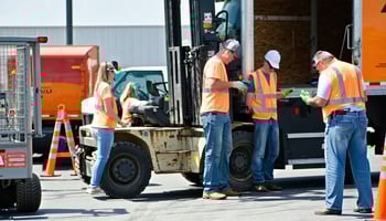 Volunteers using equipment purchased through nonprofit financing