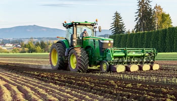 Washington farmer using financed tractor for plantings
