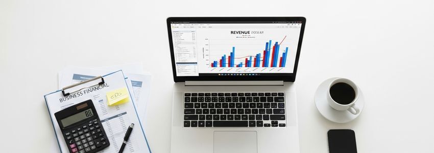 Small business owner reviewing revenue based financing options for business growth