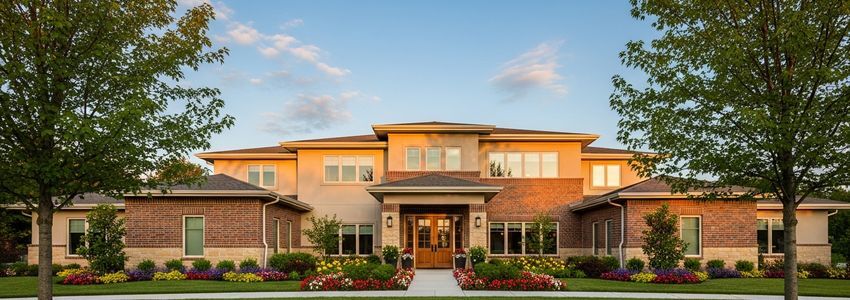 A welcoming sober living home with professional landscaping and inviting exterior