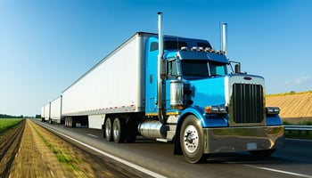  Georgia trucking company owner reviewing business loan documents