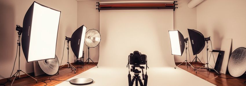 Professional photography studio with lighting equipment and camera gear