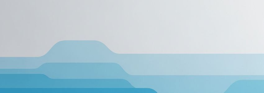 Business owner reviewing amortization schedule on laptop with financial documents