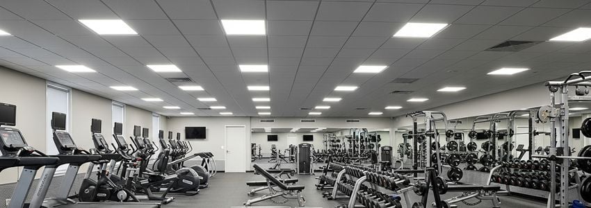 Modern Anytime Fitness gym interior with cardio equipment and open floor plan