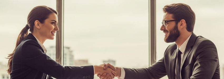 Business owners discussing expansion plans in a professional office meeting