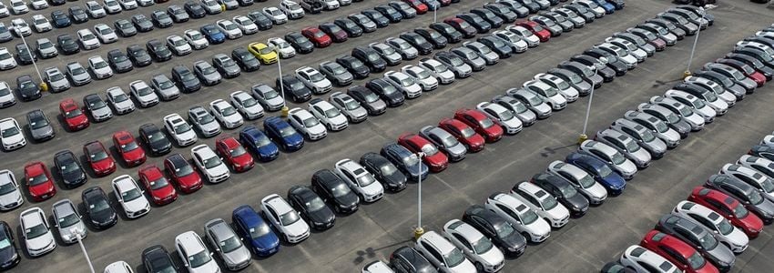 Car dealership service department with technicians and equipment — auto dealer business loans from Crestmont Capital