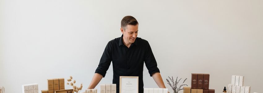 Business owner reviewing product samples with credit line financing