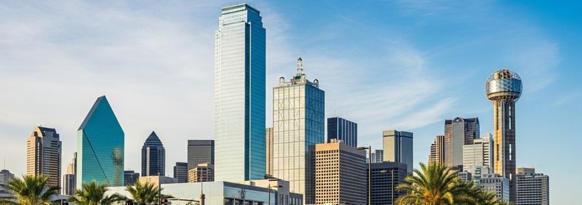 Small business professionals reviewing loan documents in Dallas Texas