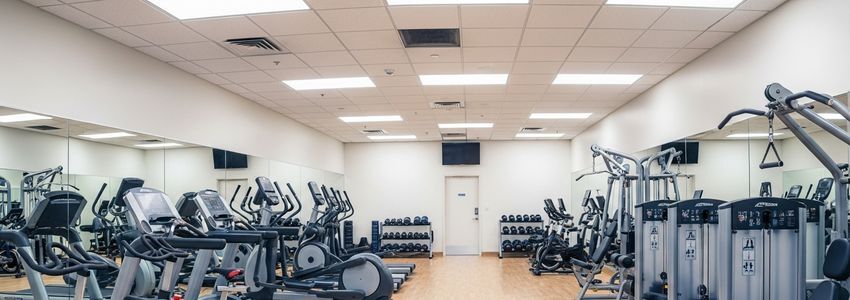 Fitness studio owner reviewing financing options for gym equipment upgrade