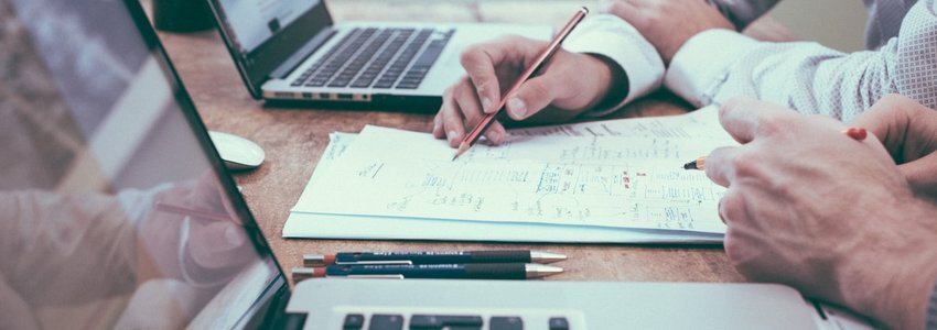 Small business owner reviewing loan documents in Fort Myers Florida office