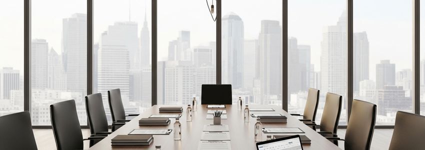 Business conference room prepared for franchise resale loan signing meeting