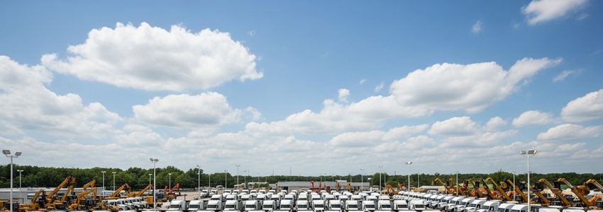 Commercial truck lot with heavy-duty trucks and construction vehicles ready for fleet financing