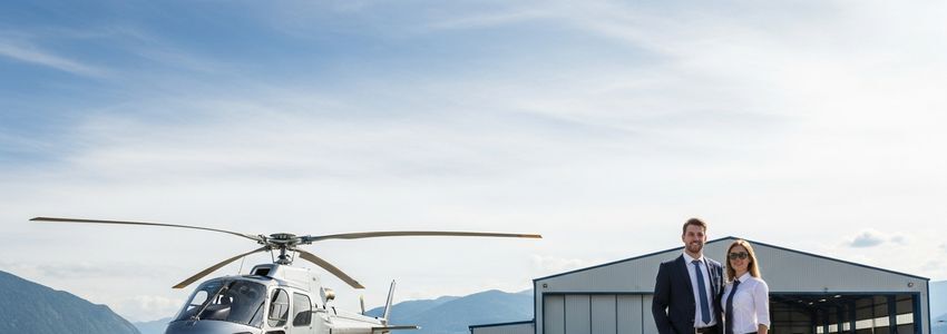 Helicopter tour business owner reviewing financing options for their aviation tour company