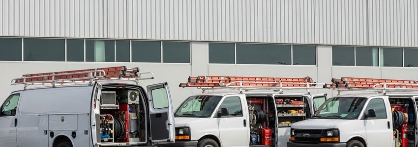 Fleet of HVAC service vans ready for commercial jobs - HVAC business fleet financing