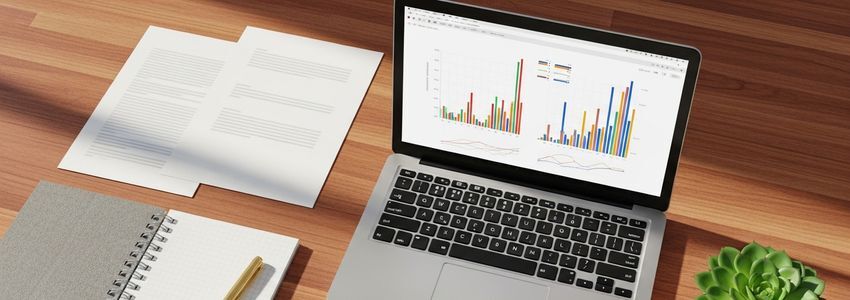 Business owner reviewing financial documents to understand how to improve credit score for business loan