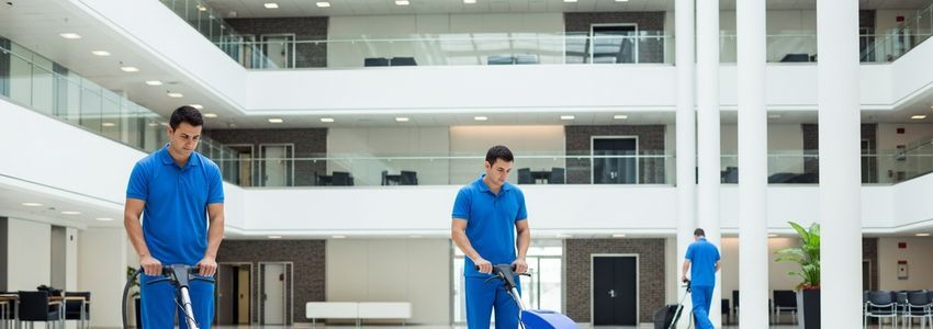 Jani-King franchise owner reviewing financing documents for commercial cleaning business