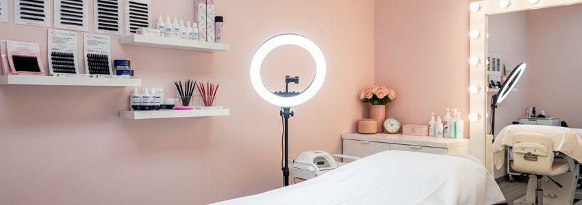 Lash technician applying lash extensions in a professional beauty studio - lash lift business loans