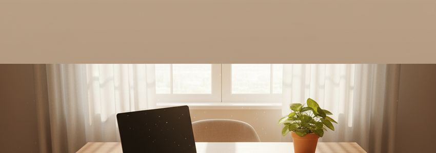 Online education business workspace with laptop and learning tools