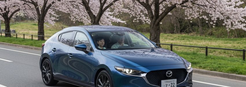 Optometrist performing eye examination in a modern clinic