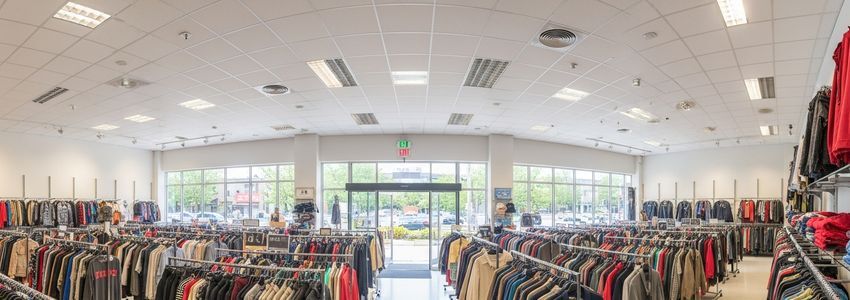 Plato's Closet franchise retail store interior showing organized clothing racks and professional setup