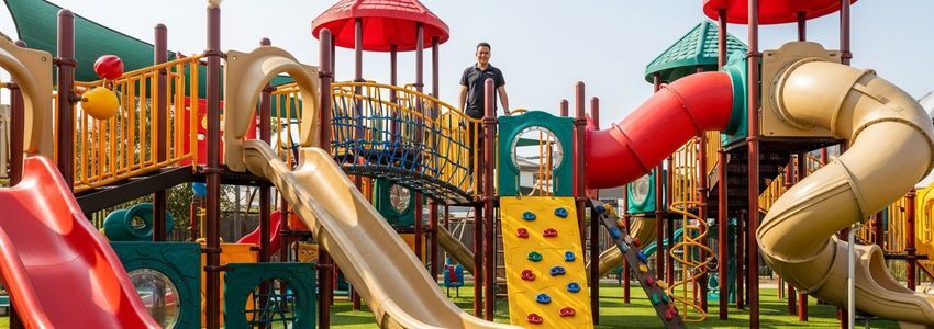 Daycare director reviewing playground equipment financing options