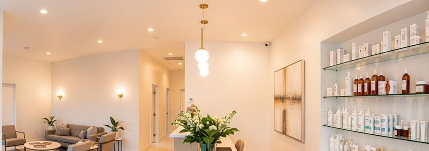 Waxing franchise salon interior showing beautiful reception area and treatment rooms