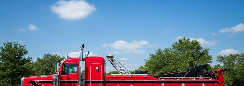 Wrecker business owner reviewing financing options - Crestmont Capital