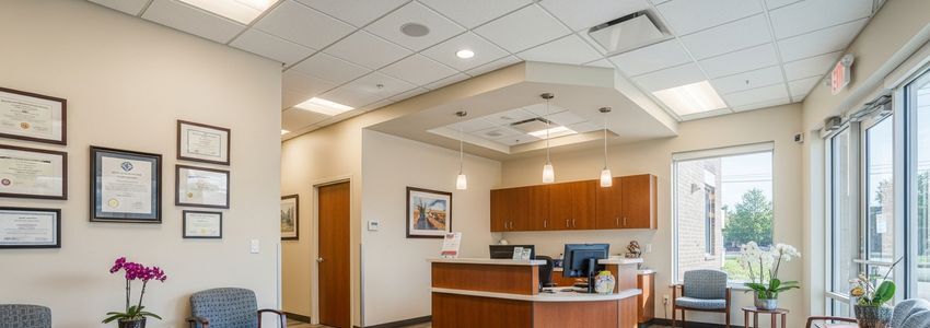 Modern medical practice office reception area showing a professional clinical environment
