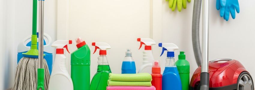 maid service business owner reviewing loan paperwork at a clean professional desk